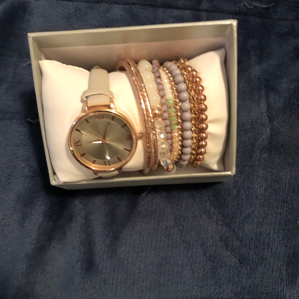 Jewelry with watch and a Heart/love necklace